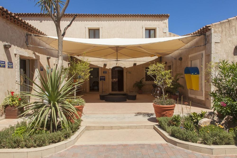 קניגיונה Centro Vacanze Isuledda מראה חיצוני תמונה